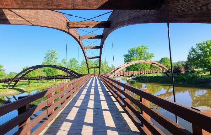 The Tridge (Midland) - A three-way wooden footbridge located where the Chippewa and Tittabawassee Rivers meet in Chippewassee Park, Midland, Michigan.