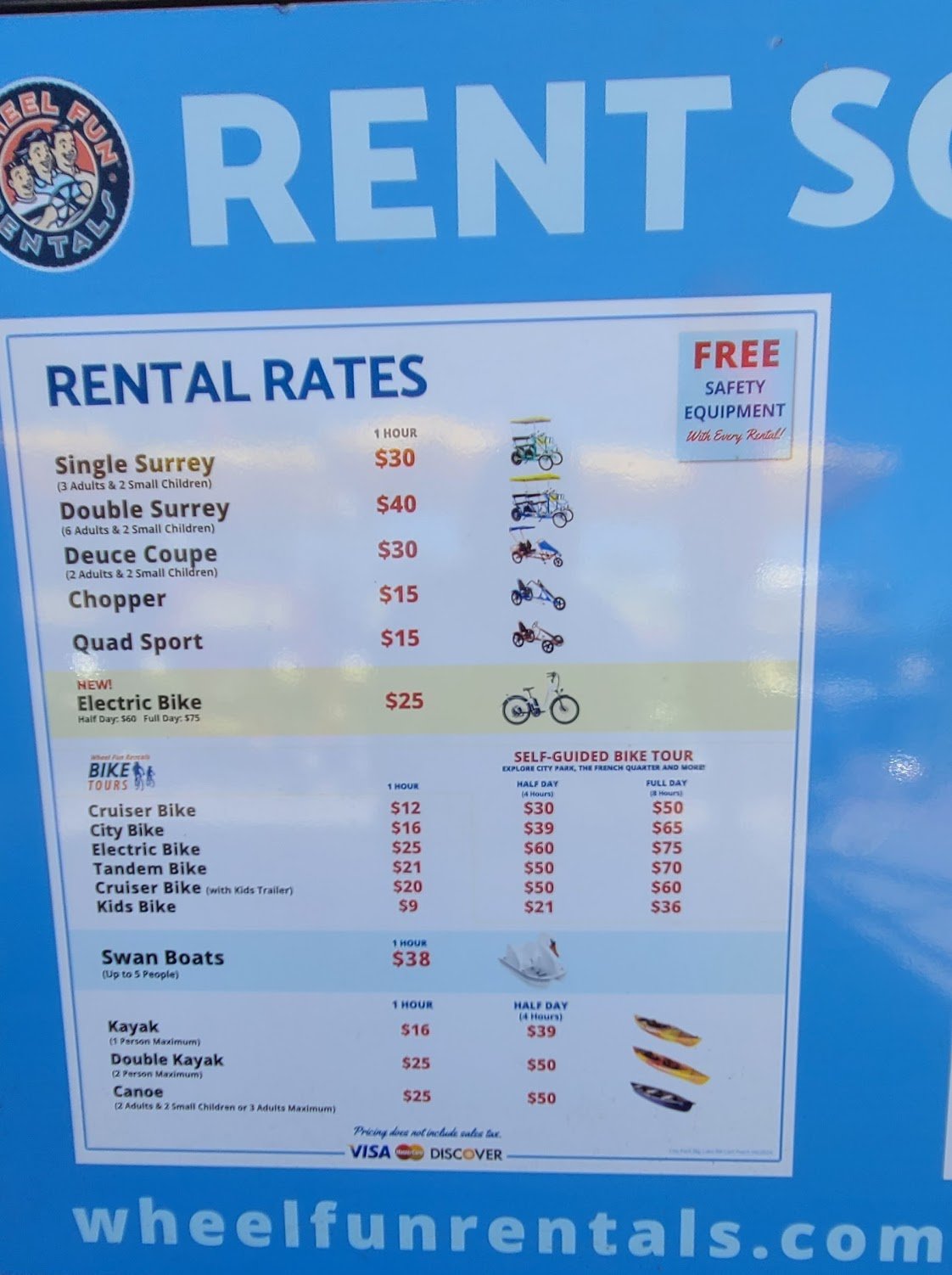 bike rental sign with prices