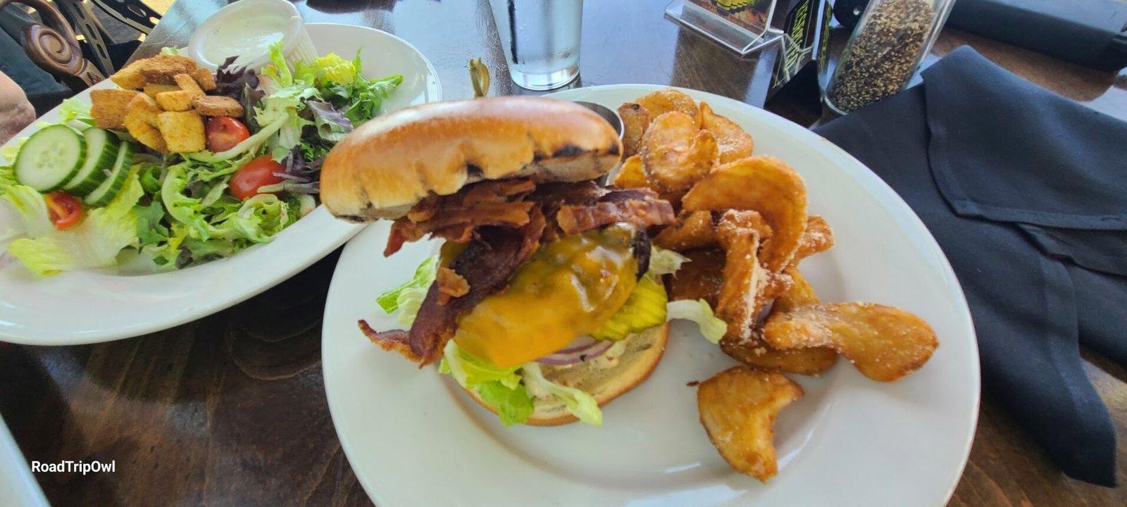 cheeseburger fries and salad with cloth napkin