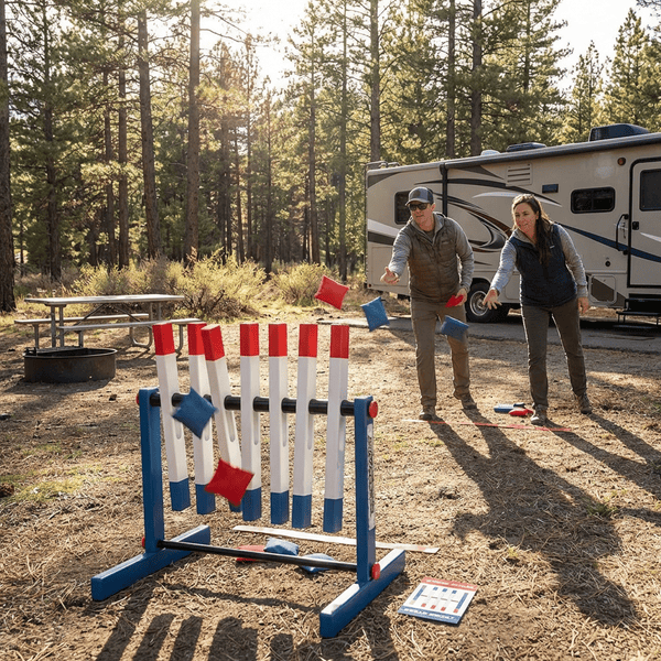 Cross Strike bean bag toss game with red white and blue rotating planks set up at a campsite