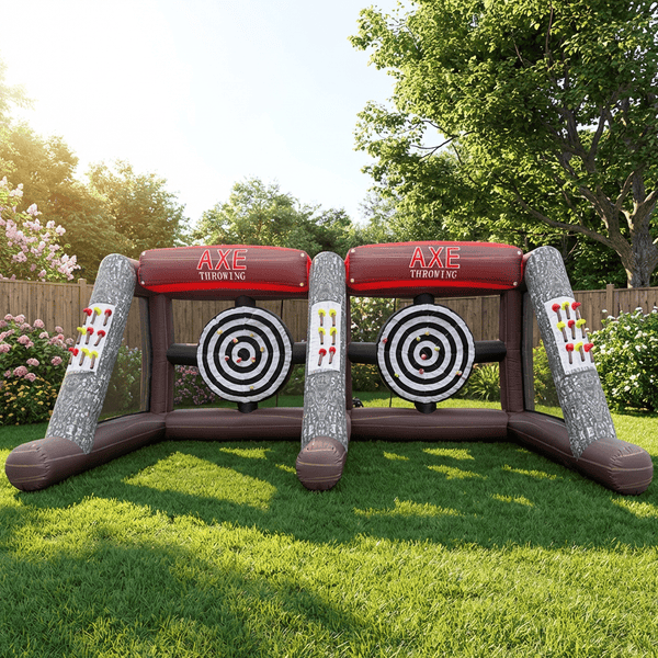 Giant inflatable axe throwing game set up on a backyard lawn with two targets side by side