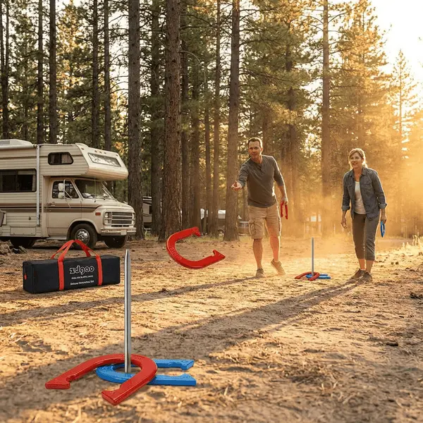 Portable red and blue metal horseshoe set with stakes ready to play at a campsite