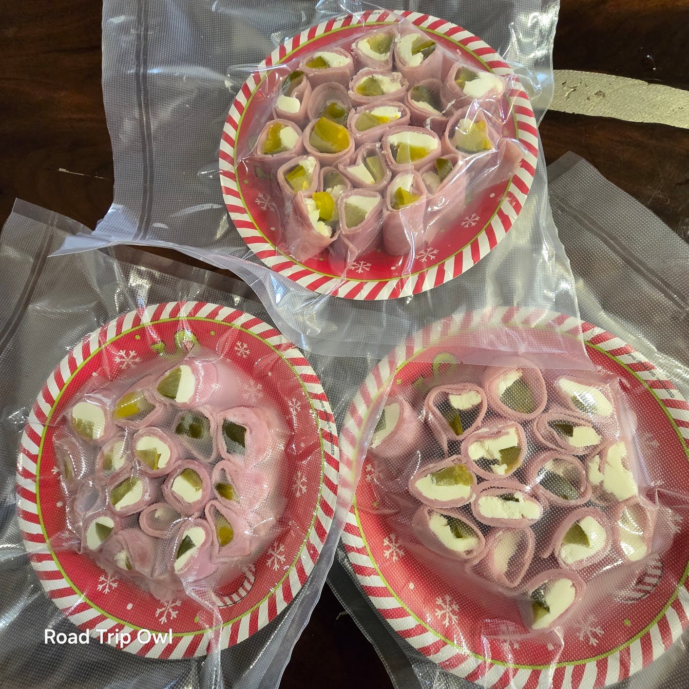 Three plates of sealed ham roll-ups — chamber vacuum sealer throw test