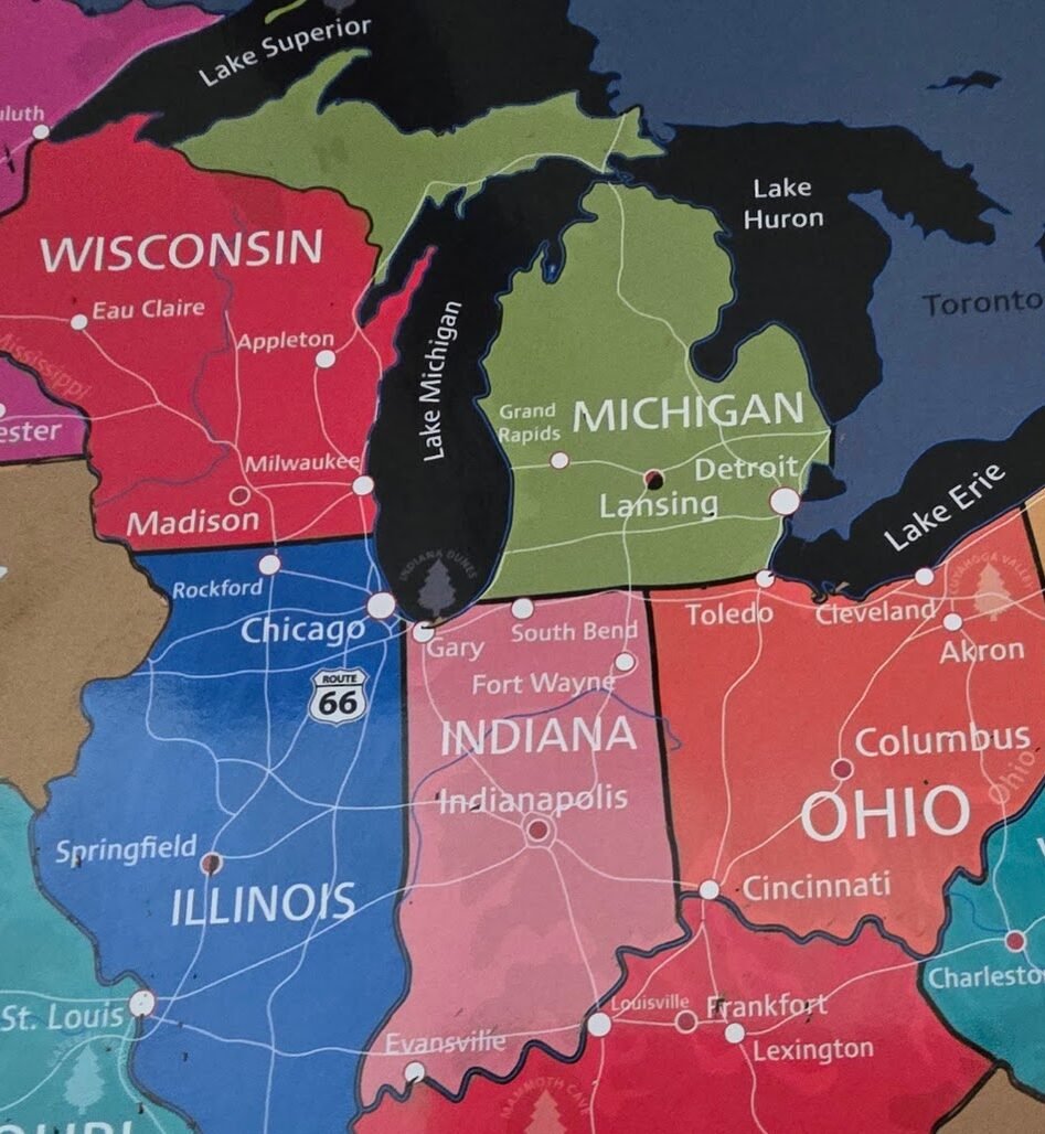 Scratch off US travel map with Michigan, Wisconsin, Minnesota and other Midwest states scratched to reveal color